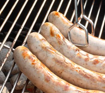 Royalty Free Photo of Sausage on a Barbecue