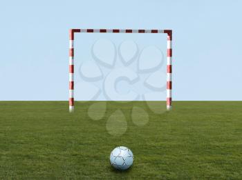 Royalty Free Photo of a Soccer Ball and Net