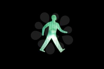Royalty Free Photo of a Green Walking Sign