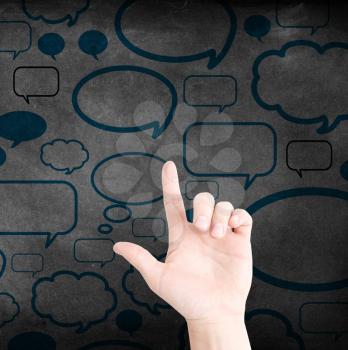 Communication with speech bubbles and a hand