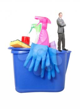 Businessman with cleaning products on white