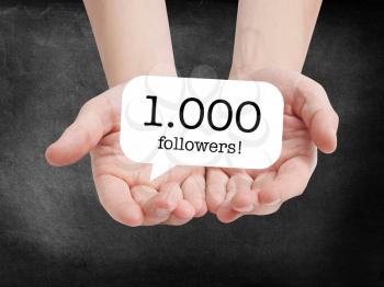 1000 followers written on a speechbubble