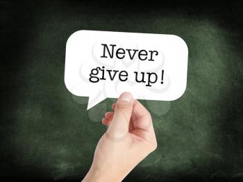 Never give up written on a speechbubble
