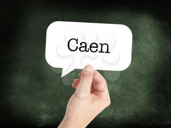 Caen written in a speech bubble