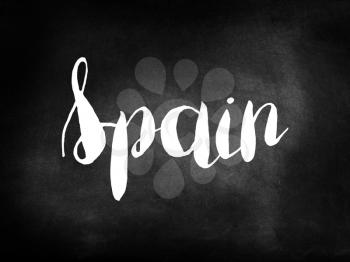 Spain written on a blackboard