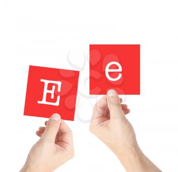Ee written on cards held by hands