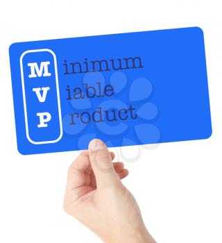 Minimum Viable Product explained on a card held by a hand