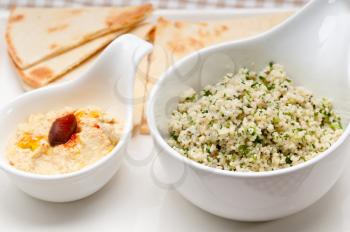 Royalty Free Photo of Arab Tabouli Couscous with Hummus