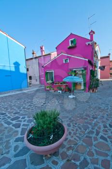 Italy Venice Burano island with traditional colorful houses 