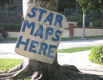 Royalty Free Photo of a Sign Telling Star Maps Sold Here