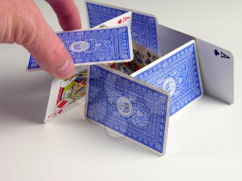 Royalty Free Photo of a Person Stacking Playing Cards