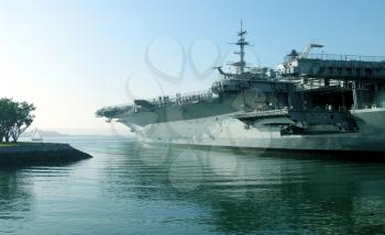 Royalty Free Photo of an Aircraft Carrier In Port