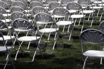 Royalty Free Photo of Folding Chairs At An Outdoor Event
