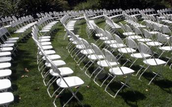 Royalty Free Photo of Folding Chairs At An Outdoor Event