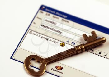Royalty Free Photo of an Instant Messaging Window and a Skeleton Key