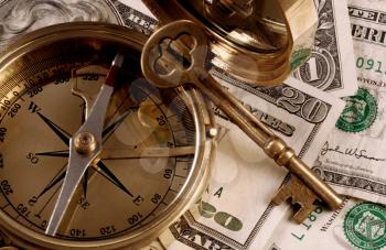 Royalty Free Photo of a Compass and Money