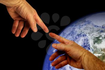 Royalty Free Photo of Hands by Planet Earth