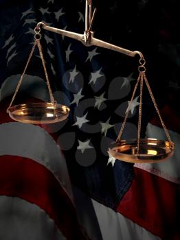 Royalty Free Photo of the Scales of Justice and an American Flag
