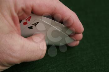 Royalty Free Photo of a Person Playing Poker