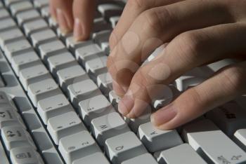 Royalty Free Photo of a Person Typing on  Keyboard