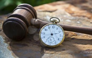 Royalty Free Photo of a Gavel and Pocket Watch