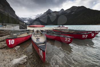 Several rental canoes on the last day of the season at Lake Louise, Banff National Park, Alberta, Canada.