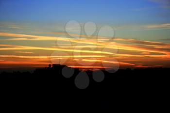 Royalty Free Photo of a Sunset Over a City