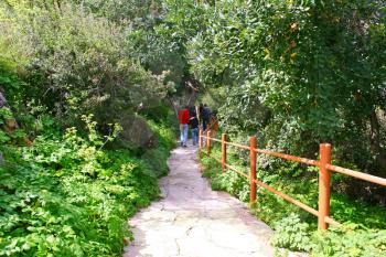 Royalty Free Photo of People on a Path to the Baths of Aphrodite in Akamas, Cyprus