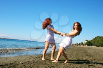 Royalty Free Photo of Two Women on The Beach 
