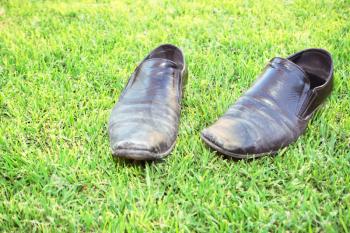 Royalty Free Photo of Shoes in Grass