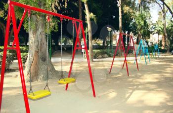 Royalty Free Photo of a Bunch of Swingsets