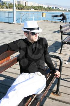 Royalty Free Photo of a Man on the Pier