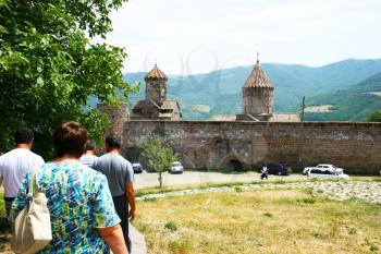 Royalty Free Photo of People by the Tatev Monastery in Armenia