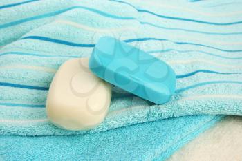 Royalty Free Photo of Soaps on Towels
