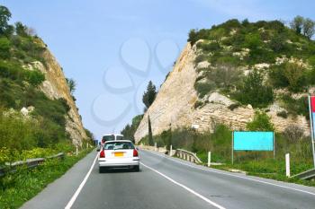 Royalty Free Photo of a Car on a Road in Cyprus