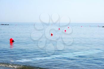 Royalty Free Photo of Red Buoys in the Sea