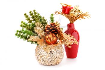 Christmas decoration in vases isolated on white background.