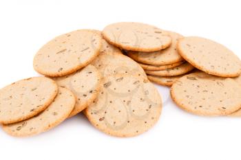 Pile of round cookies isolated on white background.