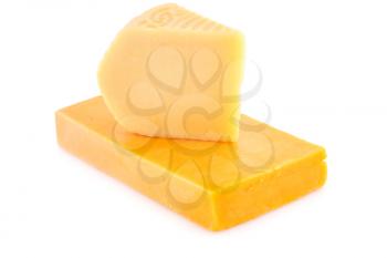 Two pieces of cheese isolated on white background.