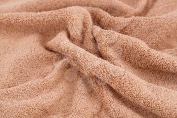 Brown towel texture as a background.