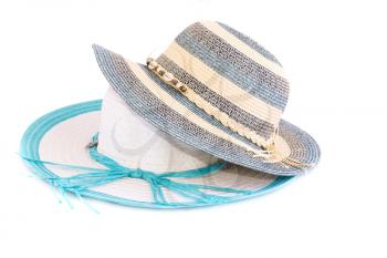 Colorful summer hats isolated on white background.