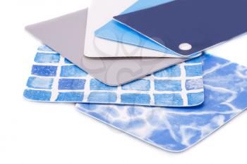 Swimming pool coating color samples on white background.