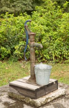 Traditional old water tap at Skansen, the first open-air museum and zoo, located on the island Djurgarden.