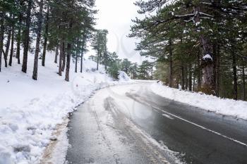 Winter scene with road on Troodos mountains in Cyprus.