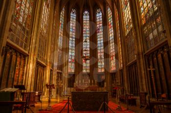 The interior with strained glass windows of the Notre Dame du Sablon's Cathedral in Brussel, Belgium.