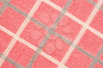 Pink, gray and white towel texture as a background.