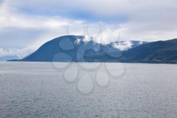 Landscape with fiord and mountains in Norway.