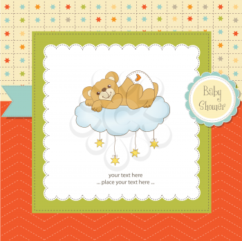 Royalty Free Clipart Image of a Baby Bear on a Cloud