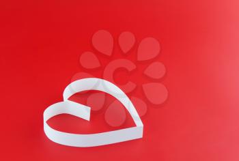 St. Valentine Day. Single  heart, on red background.