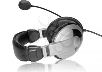 Big Headset with a microphone. On plate glass. Isolated